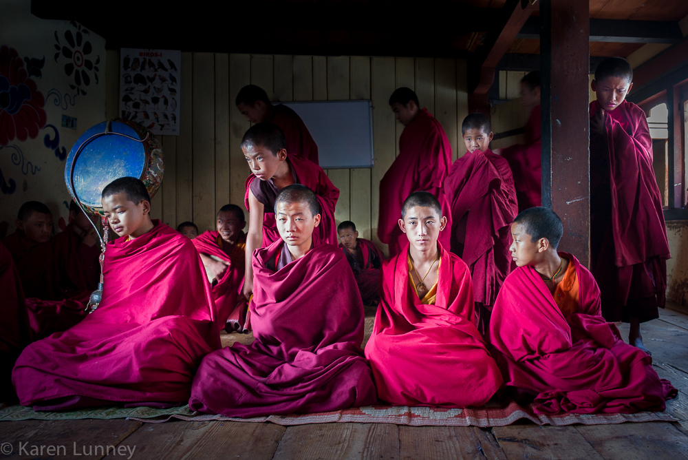 Monks praying at Lobesa Monestery